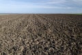 Plowed field in the autumn time Royalty Free Stock Photo