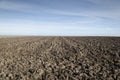 Plowed field in the autumn time Royalty Free Stock Photo