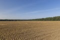 A plowed field with fertile soil for agricultural activities