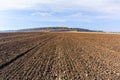 A plowed field. A landscape of agricultural land in the autumn off-season Royalty Free Stock Photo