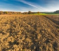 Plowed field in morning light Royalty Free Stock Photo