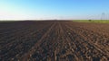 Plowed field or ploughland. Arable land in spring.