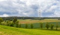 View of the plowed field. A small farm. Cereal cultivation Arable land. Good things. Royalty Free Stock Photo