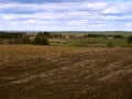 Plowed field in the spring, agricultural land under crops