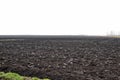 Plowed field in wintertime Royalty Free Stock Photo