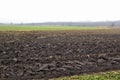 Plowed field in wintertime Royalty Free Stock Photo