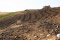 Plowed hillside field Royalty Free Stock Photo