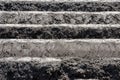 Plowed land with horizontal furrows Royalty Free Stock Photo