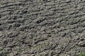 Plowed soil on a farm field for sowing in the spring Royalty Free Stock Photo