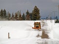 Plowing the Rural Road Royalty Free Stock Photo