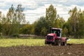 Plowing tractor.