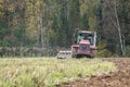 Plowing tractor.