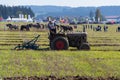 Plowing vintage veteran tractors on field on ploughing championship Royalty Free Stock Photo