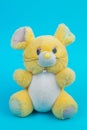 Pluche toy mouse on a blue background Royalty Free Stock Photo
