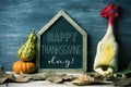 Plucked turkey and text happy thanksgiving day