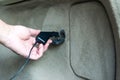 Plug in DC 12 volt socket in the car trunk Royalty Free Stock Photo
