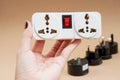 Plug socket in hand Royalty Free Stock Photo