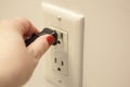 Plugging in a cord Royalty Free Stock Photo