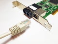 Plugging in a UTP cable into a LAN network card