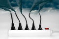 Plugs ejecting smoke - Pollution concept Royalty Free Stock Photo