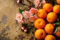 Plum blossoms flower and mandarin orange symbol of prosperity, lunar new year gold backdrop , Chinese new year background.