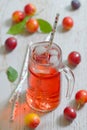 Plum compote in glass jar