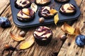 Rustic cupcake with plum