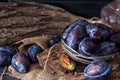 Plum. Fresh plum. Harvest. fresh blue plums on a dark table. Autumn harvest of plums. healthy eating concept. Food Photo Royalty Free Stock Photo