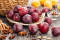 Plum group on wood Royalty Free Stock Photo