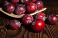 Plum group on wood Royalty Free Stock Photo
