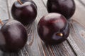 plum group on wood Royalty Free Stock Photo
