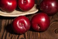 Plum group on wood Royalty Free Stock Photo