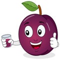 Plum Holding a Fresh Squeezed Juice Royalty Free Stock Photo