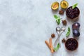 Plum jam and ingredients for its preparation: plums, cinnamon, star anise and mint. Homemade marmalade for Breakfast Royalty Free Stock Photo