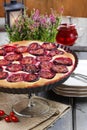 Plum pie on party table Royalty Free Stock Photo