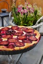 Plum pie on party table Royalty Free Stock Photo
