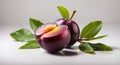 Plum with a slice and leaf Royalty Free Stock Photo