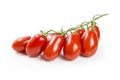 Plum tomatoes over cutting board Royalty Free Stock Photo