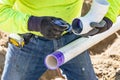 Plumber Applying Pipe Cleaner, Primer and Glue to PVC Pipes