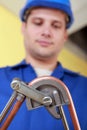 Plumber bending copper pipe Royalty Free Stock Photo