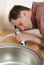 Plumber with caulking gun Royalty Free Stock Photo