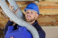 plumber checking ceiling pipes Royalty Free Stock Photo