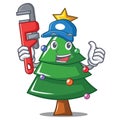 Plumber Christmas tree character cartoon Royalty Free Stock Photo