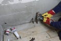 Plumber constructing pipework
