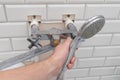 Plumber fixed leaking shower head
