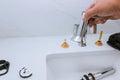 Plumber holding a faucet plumbing assemble repair service Royalty Free Stock Photo