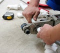 Plumber installing pipes Royalty Free Stock Photo