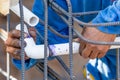 Plumber Installing PVC Pipe at Construction Site Royalty Free Stock Photo