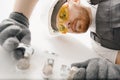 Plumber installing water taps shower stall, work in bathroom Royalty Free Stock Photo