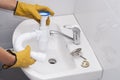 Installation of a siphon for a sink Royalty Free Stock Photo